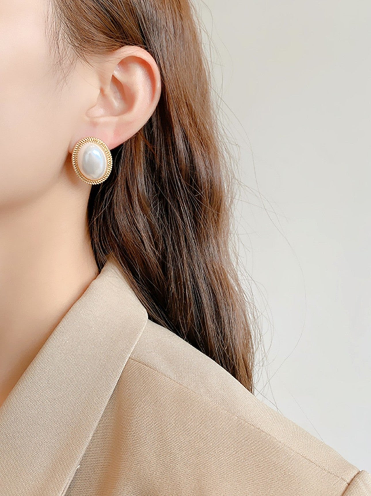 Gold pearl earrings